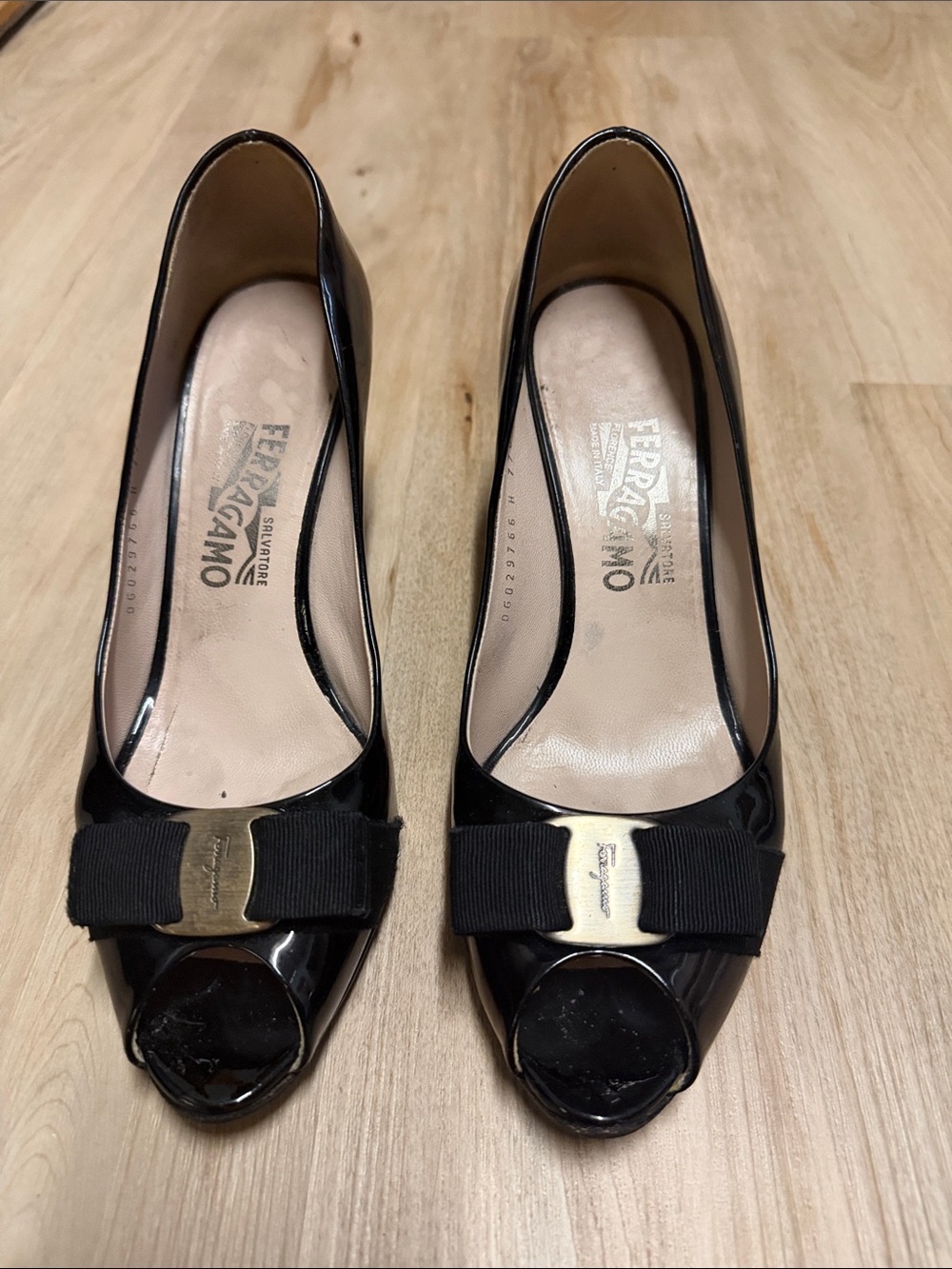 Salvatore Ferragamo Black Patent Peep-Toe Bow Pumps with Gold Plaque